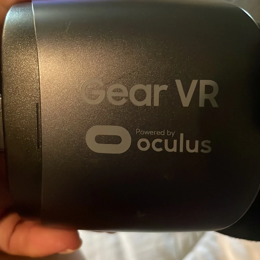 Used, fairly new. Samsung VR headset with control